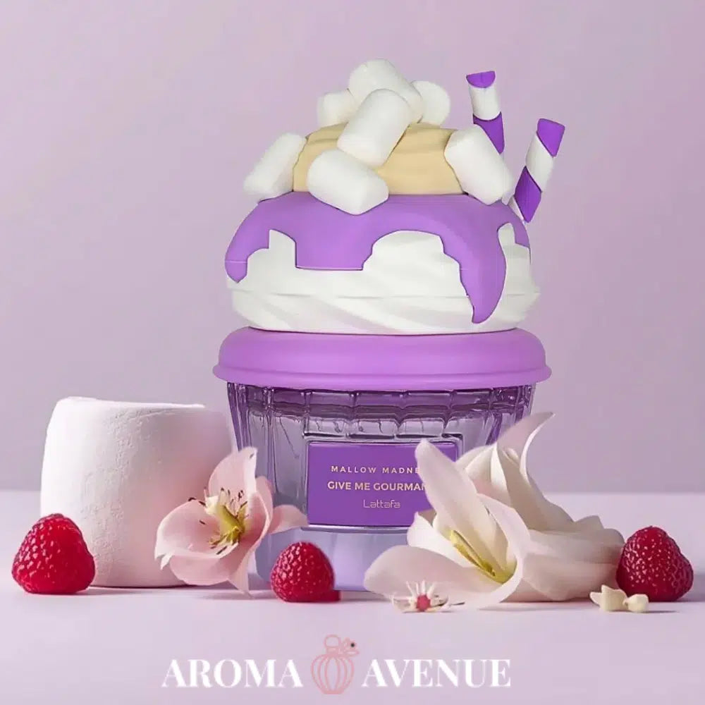 Lattafa Give Me Gourmand – Mallow Madness: parfum unisex dulce-fructat, cu căpșuni, zmeură, bezea și vanilie cremoasă.
